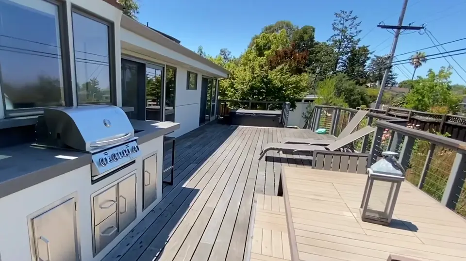 Stainless steel BBQ island built into an outdoor kitchen
